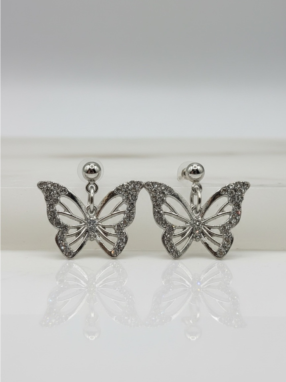 Silver Tone Rhinestone Butterfly Dangle Earrings NWOT Sparkly Statement Jewelry
